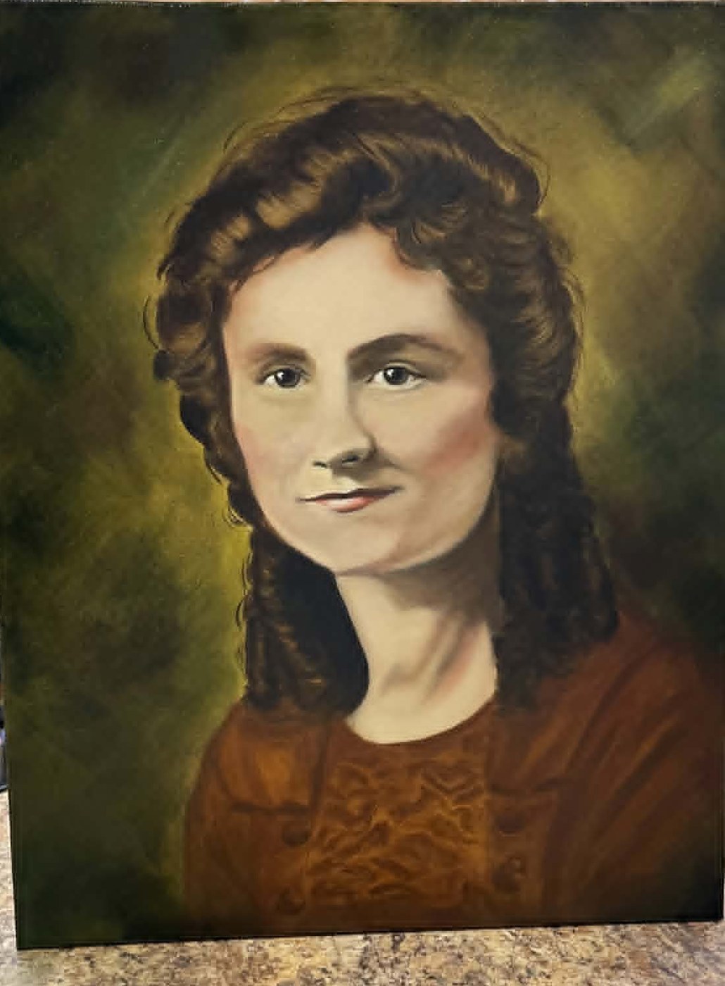 Green and Gold, oil portrait of a woman with curly brown hair in a rust dress on an olive-gold ground